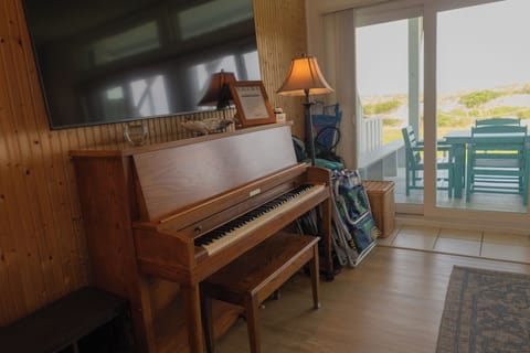Play or relax to piano tunes that complement the home’s calm vibe.