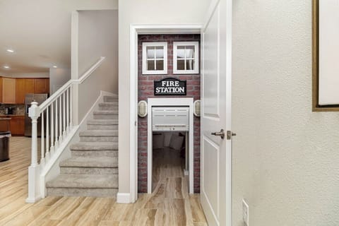 Tucked under the stairs and just off the kitchen, this cozy firehouse-themed playroom is perfect for little firefighters! With fun decor and plenty of toys, it's a great spot for kids to unleash their imaginations while you relax nearby.