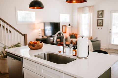 The kitchen island is any aspiring chef's dream workspace with lots of room for chopping, slicing, and cooking up a delicious meal! 