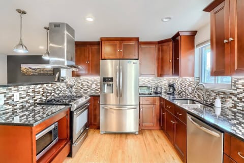 The beautifully updated kitchen provides ample room for your entire group to cook and entertain.