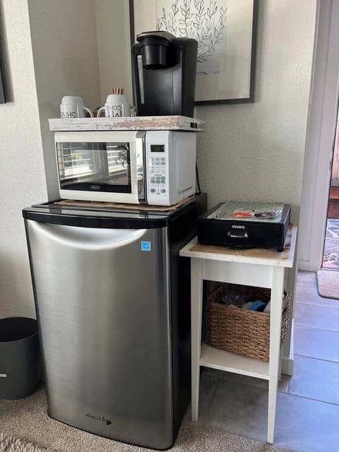 Mini fridge, microwave, Keurig, supplied with coffee, tea and hot coco. 