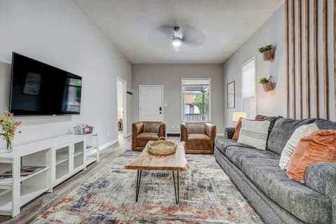 Enjoy relaxing in the spacious living room with the large 55" Smart TV!