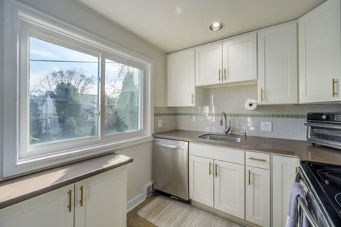 Keep an eye on the family's outdoor adventures while working your culinary magic