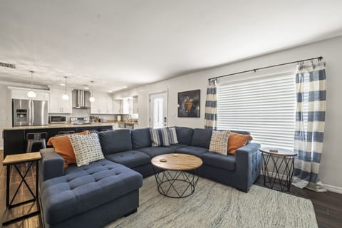 Open floor plan with kitchen open to family room, dining room and sunroom.