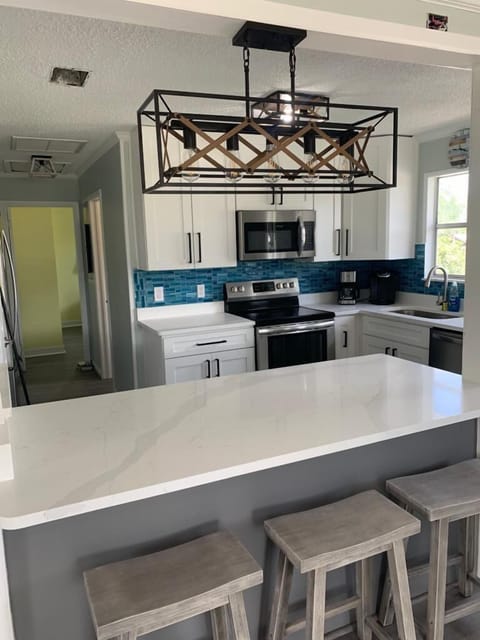 Kitchen with all of the essentials to cook your meals! - Second Floor