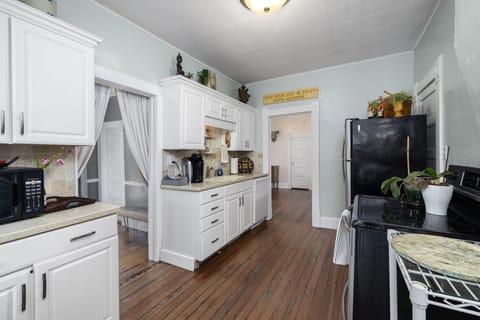 Large Kitchen for cooking and hosting a meal.  