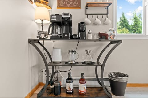Deluxe coffee bar equipped with drip, K-cup/single-serve, Nespresso, French Press, Pour over. Coffee grinder, sugar and flavored syrups available