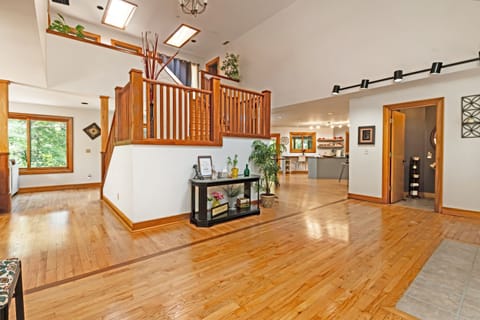 Front entrance. View of stairs, and landing. 