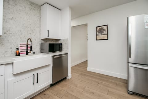 Microwave, Dishwasher and Refrigerator.