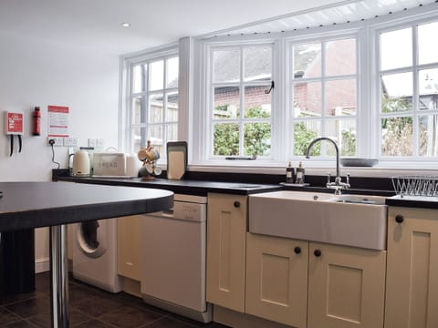 Kitchen with Belfast sink | Three Batch Cottages, Chaddesley Corbett, near Bromsgrove