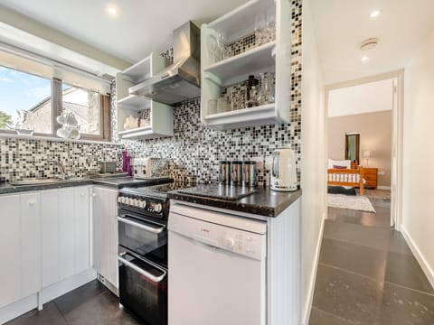 Kitchen | Rhandir Long House - Cennen Cottages at Rhandir Farm, Trapp, near Llandeilo