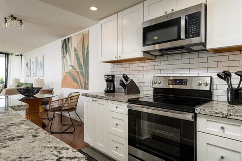 Chef's delight! Experience ultimate convenience in our fully equipped kitchen with all-new stainless steel appliances.