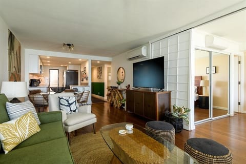 Unwind & connect! This comfortable living room looks toward the kitchen, making entertaining a breeze.