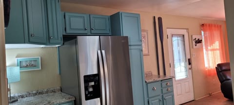 new frig with water and ice in door