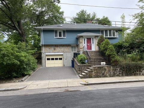 Front view of the  single house builded on the hill in a nice street of Boston