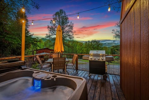 Enjoy the mountain view while soaking in the hot tub