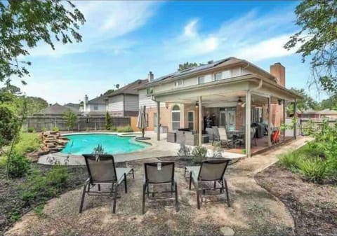 Large Pool with Spa. Patio with TV for the perfect entertainment.