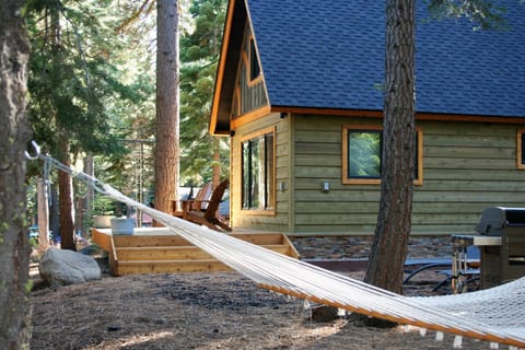 Beautiful yard with hammock, lounge chairs & grill
