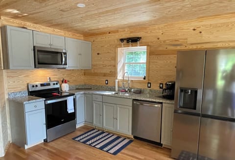 Modern kitchen with everything you need to make meals. 