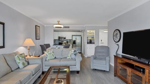 Bright and comfortable living room space with sleeper sofa