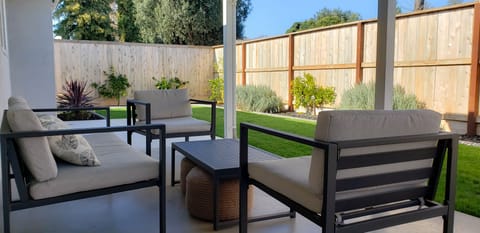 Great size yard to BBQ (available upon guest request), Play and for Pets.