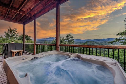 Soak in the hot tub while soaking in the mountain view at the same time. 