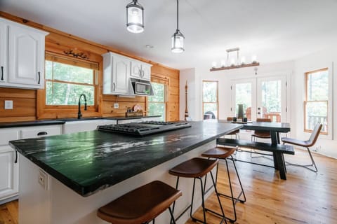 Newly renovated and fully stocked kitchen with all basic cooking necessities.