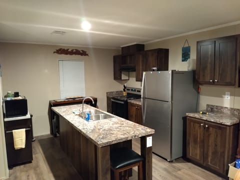 Kitchen with double sink in island. 🏝️