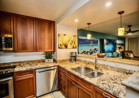Smooth and shiny granite countertops make this the perfect space for serving!