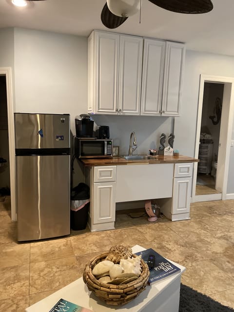 Nice size fridge, toaster. Microwave, two burners. small blender. 