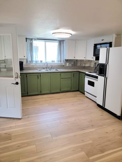 The centerpiece of this Airbnb is its fully equipped kitchen, ample counter space, making meal preparation a breeze.