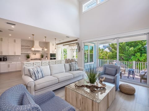Open living room with doors to patio