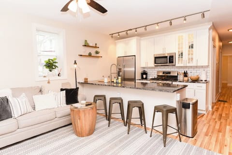 View of the dining area from the living space, creating a bright and open atmosphere.