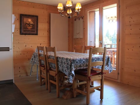 Furniture, Property, Table, Wood, Chair, Picture Frame, Interior Design, Lighting, Window, Floor