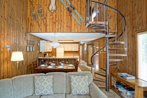 Spiral staircase leads to the loft area