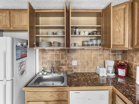 Remodeled kitchen is fully-equipped with pots, pans & utensils.