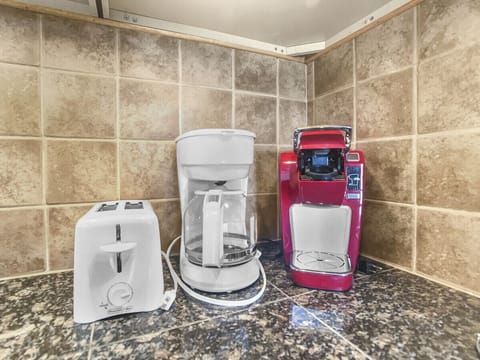Remodeled kitchen is fully-equipped with pots, pans & utensils.