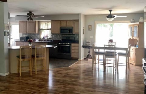 Full kitchen with all the appliances you can think of. Kitchen island and Table.