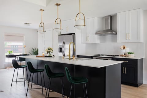 Open concept kitchen - includes gas range, oven and full size fridge/freezer