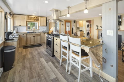 Updated kitchen with spacious island and unbeatable lake views.