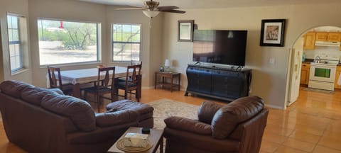 living room, dining table overlooking the front yard