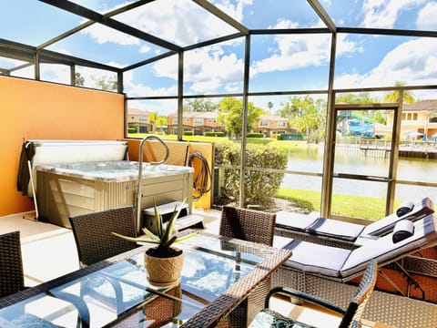 Private lanai with hot tub, lounge area and water views!