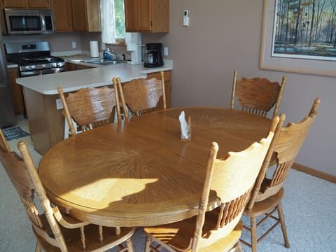 DINING AREA:  The home has a cute dining area with great views and seating for 6 adults.