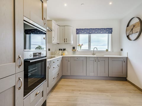 Kitchen area | Willow Tree Cottage - Coastal View Cottages, Ludchurch, near Narberth