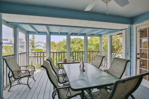 Porch Screened porch where you can enjoy the beautiful views of the water and the sunrise