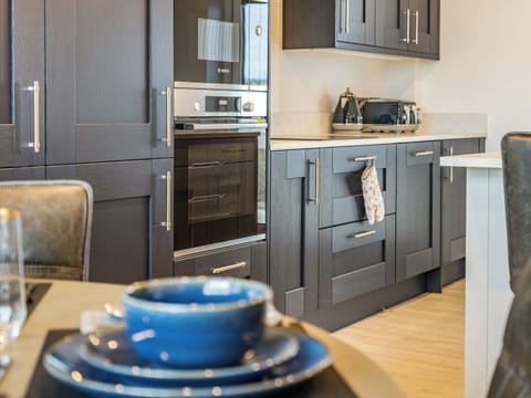 Kitchen area | Bay Tree Cottage - Coastal View Cottages, Ludchurch, near Narberth