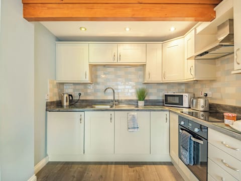 Kitchen | Y Stabal - Penrhyn Farm Cottages, Llanfwrog, near Holyhead