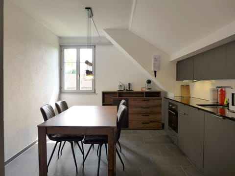 Cabinetry, Furniture, Table, Property, Countertop, Window, Chair, Building, Sink, Wood