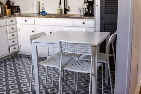 Enjoy meals together in our charming dining area, perfect for four. Gather around and share stories over a delicious meal.