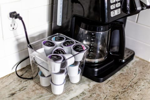 Cook up your favorite meals in style! Our fully-equipped kitchen features a fridge, freezer, microwave, oven, electric stove, Keurig & drip coffee maker combo, and more.